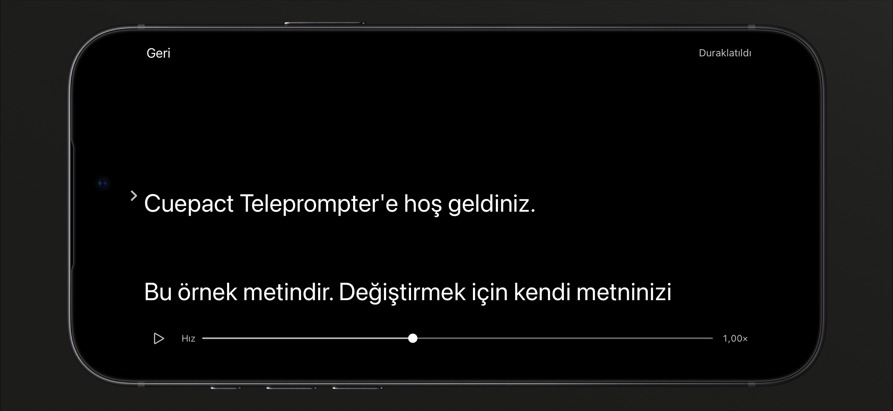 iPhone'da duraklatılmış okuma modunda Cuepact Teleprompter; oynat düğmesi ve hız kaydırıcısıyla.